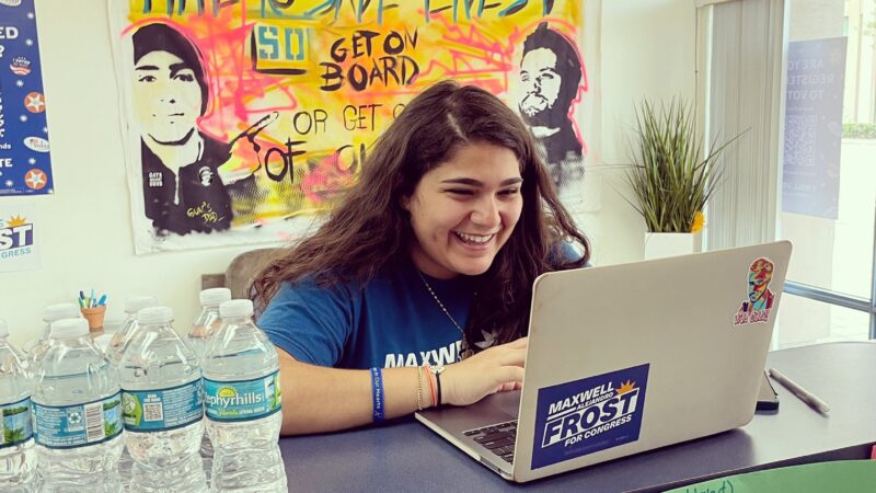 Ray Anid works on her laptop in the Team Frost office.